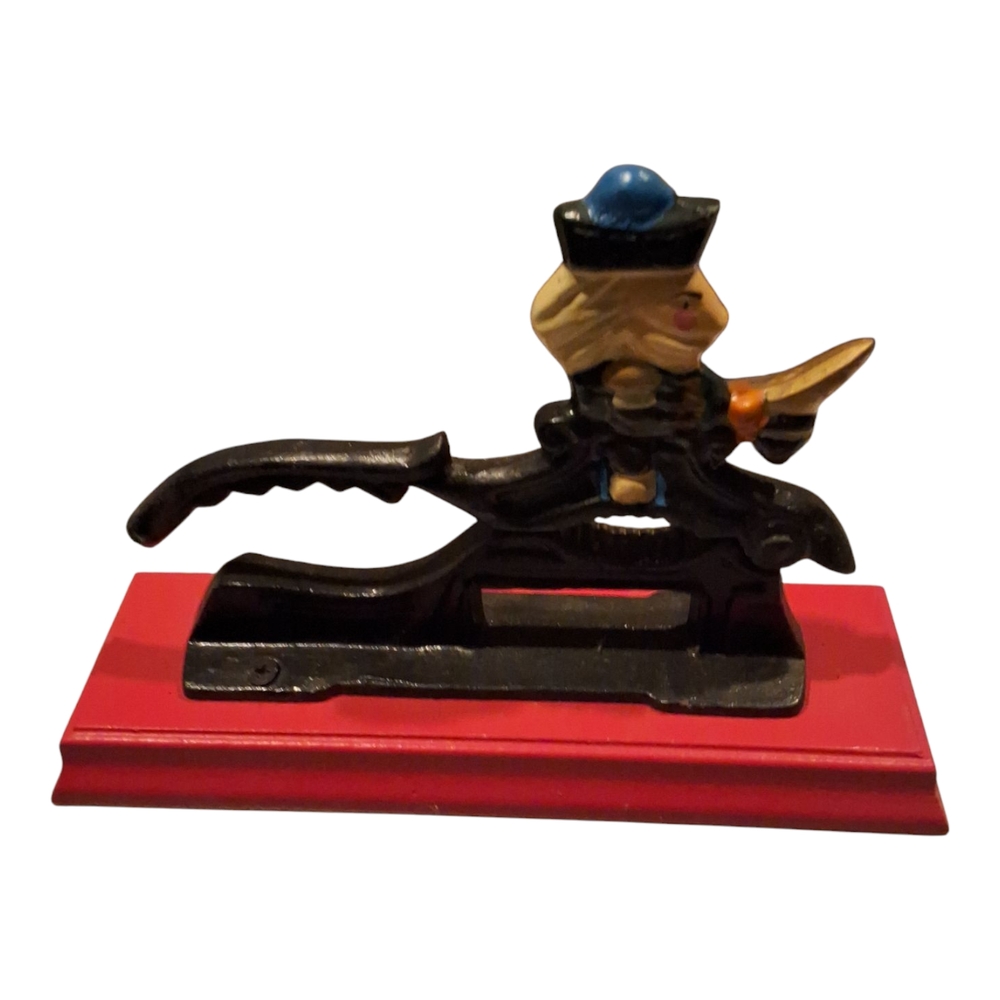 Vintage Cast Iron Nutcracker with Red Base